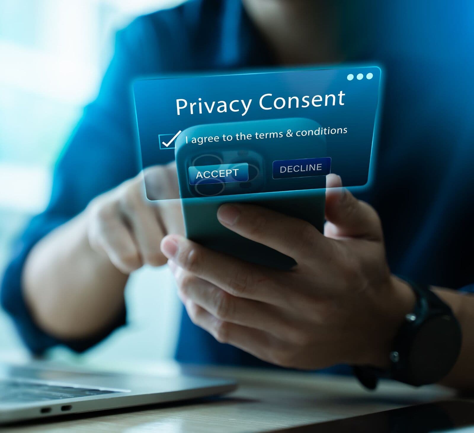 Person accepting a privacy consent prompt on a phone